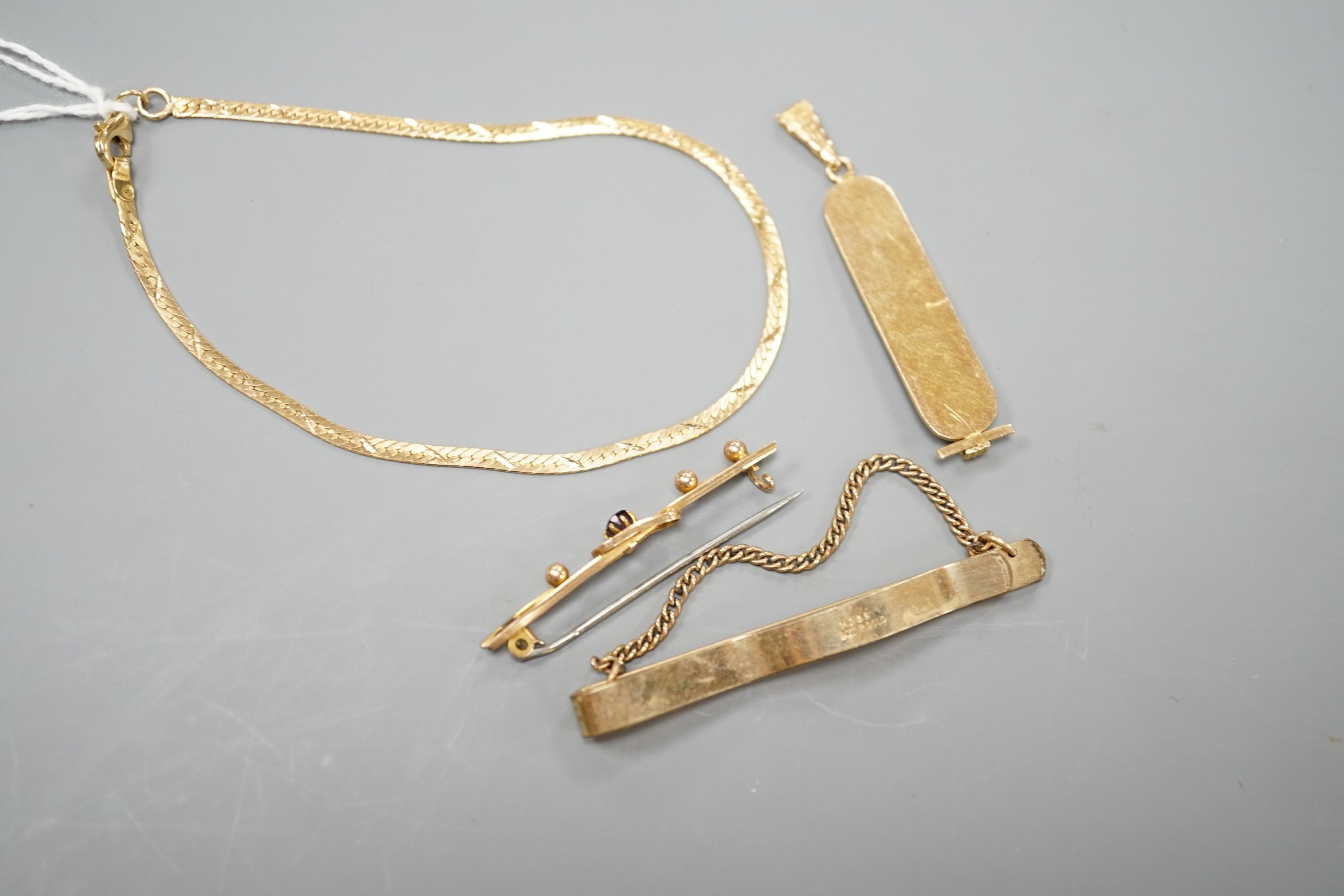 A Middle Eastern pendant and bracelet, gross 6.5 grams, together with a 9ct bar brooch and a rolled gold tie clip.